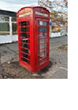 A red telephone box.